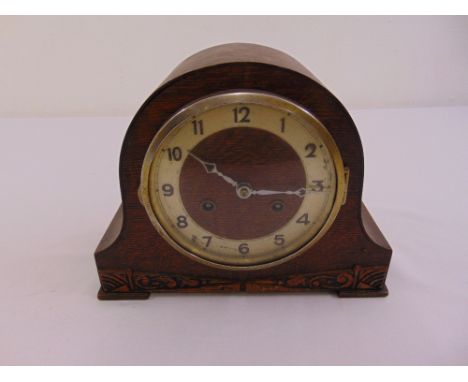 An early 20th century mahogany mantle clock, silvered dial, Arabic numerals