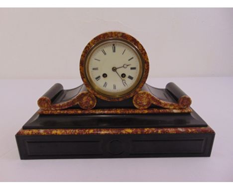 A black marble mantle clock, white enamel dial, Roman numerals, two train movement