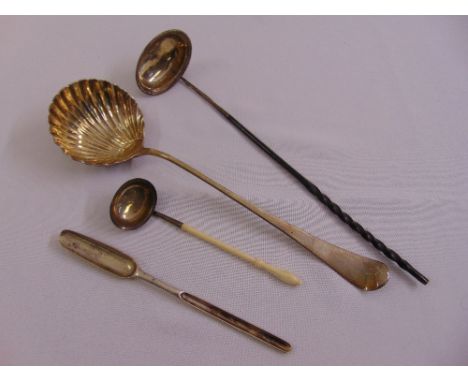 A silver ladle, a silver ladle with ivory, a toddy ladle and a marrow scoop