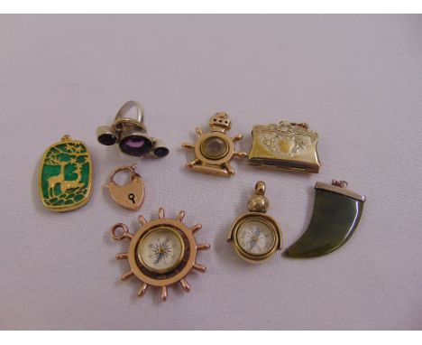 A quantity of costume jewellery to include pendants, a ring and 9ct gold padlock