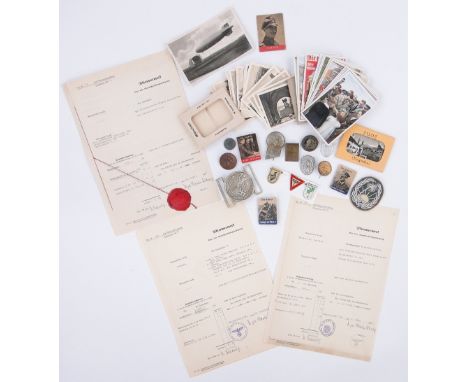 A Collection of Nazi Memorabilia,
including Day badges, 1930s sporting badges, Second World War propaganda booklets, etc.