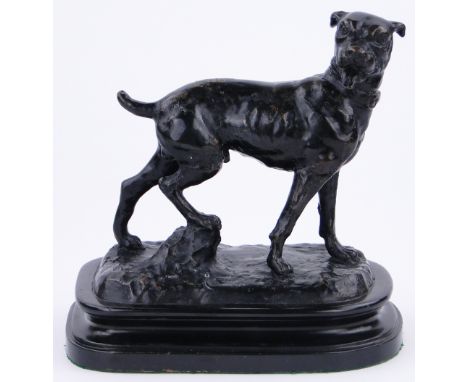 A reproduction patinated bronze dog,
on wooden plinth, overall height 10", length 9.5".