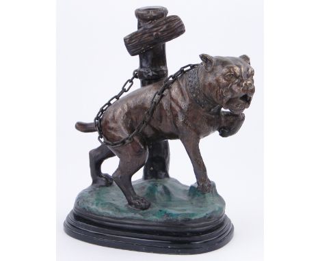 A reproduction patinated bronze bulldog,
on marble plinth, overall height 13.5", length 12".