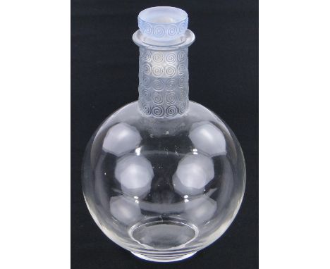 A Rene Lalique bulbous glass decanter,
with relief moulded blue stained neck and stopper, height 7.5", etched signature, stop