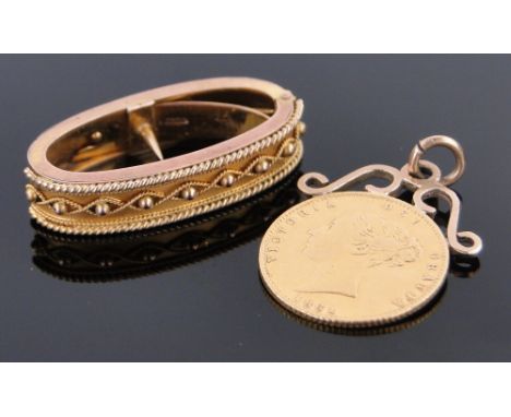An 1861 gold half sovereign pendant,
and a Victorian 9ct gold filigree decorated scarf clip, in original Morocco leather case