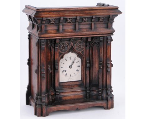 An oak Gothic mantel clock,
with single fusee movement, by Burch of Maidstone, circa 1850, height 15.75".