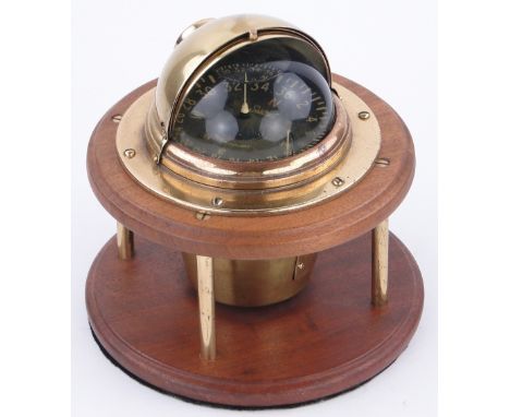 A "Sestrel" boats compass by Henry Brown & Son,
on mahogany stand, diameter 7.75".