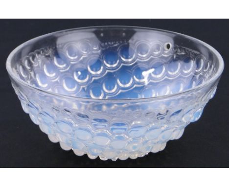 A Rene Lalique opalescent glass bowl,
with trailing bubble designs, 8" across, etched signature, drilled rim to convert to a 