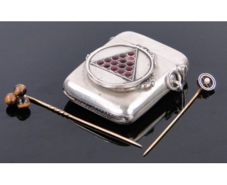 A silver vesta case,
with snooker ball enamel front, Chester 1912 together with a tiger's eye mounted gold stickpin and a pea