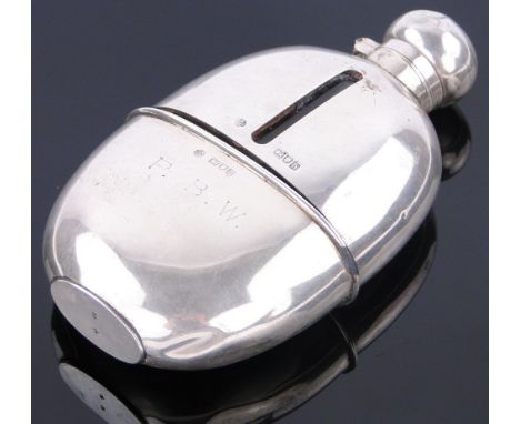 A silver hip flask,
London 1903, height 13cm.