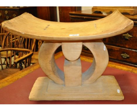 A carved Ashanti stool.