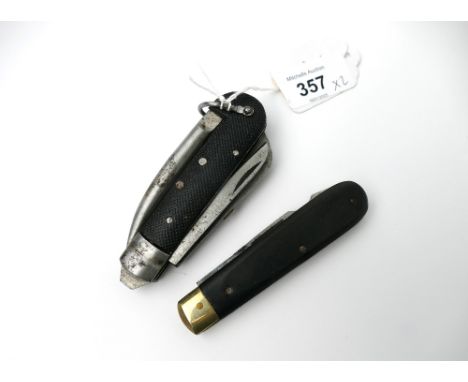 Two penknives, one marked 910-5285 - This bladed product is not for sale to people under the age of 18. By bidding on this it