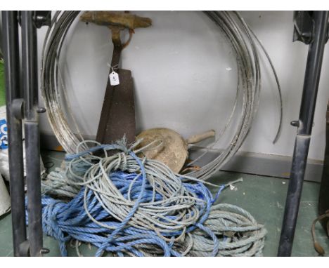 Vintage tools, hay knife, scoop, wire and rope.