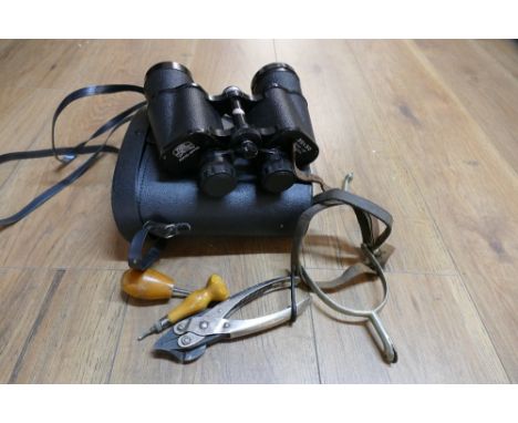 Mark Scheffel 35 x 50 field binoculars, set of spurs and leatherworking tools