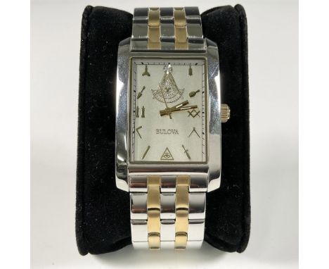 Rarely offered Bulova Accutron Masonic steel &amp; gold tone watch with square silver face. The dial includes the freemason s