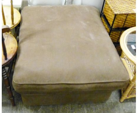 A combination pouffe fold-out put-me-up bed