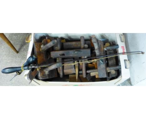 A box and contents, including wood working tools