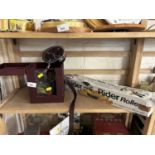 A carriage clock case together with a vintage mantel clock and a Guider Rider Rollers for moving