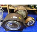 Three dome topped mantel clocks