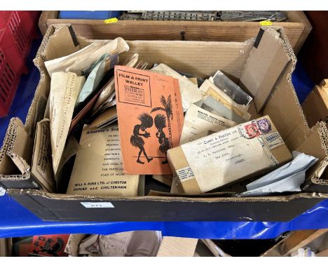 Box containing a quantity of vintage photographs and negatives
