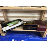 Boxed energy monitor together with jewellery boxes and cash tin