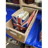 A wooden soda syphon crate together with a quantity of singles