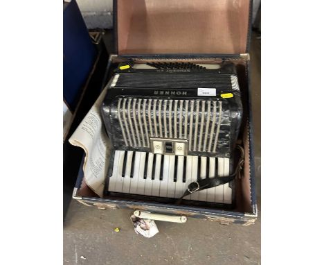 A Hohner student VM accordion in case