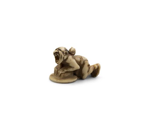 λ A CARVED IVORY NETSUKE WITH ONE HIMOTOSHI, SIGNED.   Japan, Meiji period (1868-1912)Modelled as a startled rat catcher in k