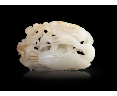 A RETICULATED WHITE JADE ‘EGRETS AND LOTUS’ GROUP明代 青白玉透雕China, Ming dynasty.carved in openwork with an egret amongst floweri
