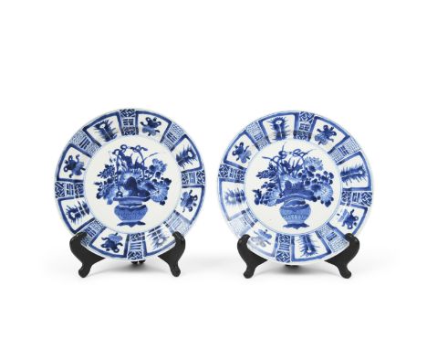 A PAIR OF FINELY PAINTED BLUE AND WHITE 'FLORAL' DISHES WITH KITE MARKChina, Kangxi period (1654-1722)清康熙 青花雙藍圈風箏款 ‘八卦花籃紋’盤一對
