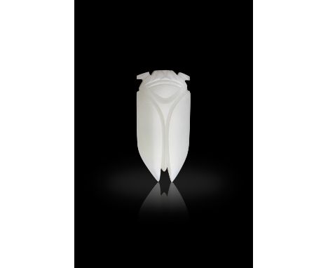 A PALE CELADON JADE CICADA漢代 白玉蟬China, Han DynastySharply incised with concise strokes on both sides and modelled with elonga