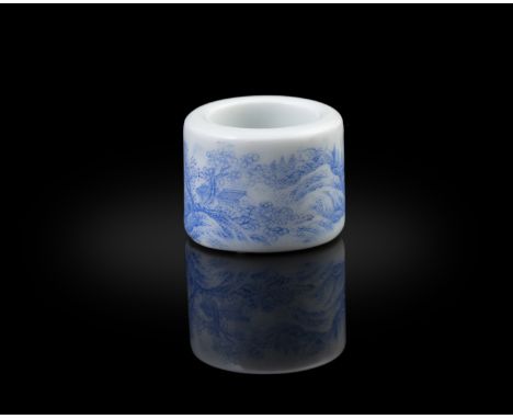 A BLUE AND WHITE’LANDSCAPE’ ARCHER’S RING, MARKED QIANLONG晚清 乾隆款 青花山水扳指China, late Qing dynasty.Painted in soft blue with a c
