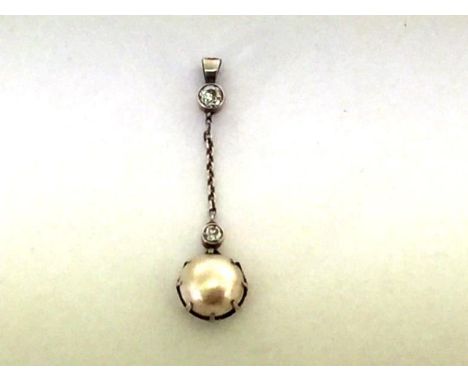 A mabe pearl and diamond pendant, circa 1915, the hemispherical pearl drop 9.7mm diameter, an old brilliant cut above, to an 