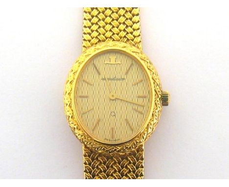 Jaeger LeCoultre, a lady's 18 carat gold quartz wristwatch, ref. 120.018.1, no. 1568861, the patterned oval dial with baton n
