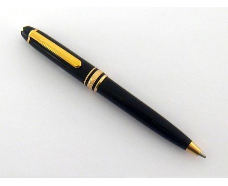 Montblanc Meisterstuck, a black resin roller ball pen, no. MM1047095, engraved with initials 'F.M', 10.5cm long, no box or pa