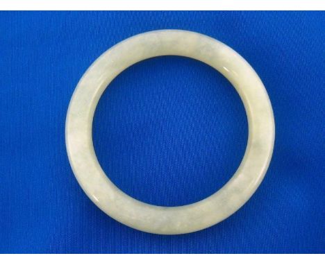 A bowenite bangle, of circular section, 5.8cm inner diameterCONDITION: good overall condition 