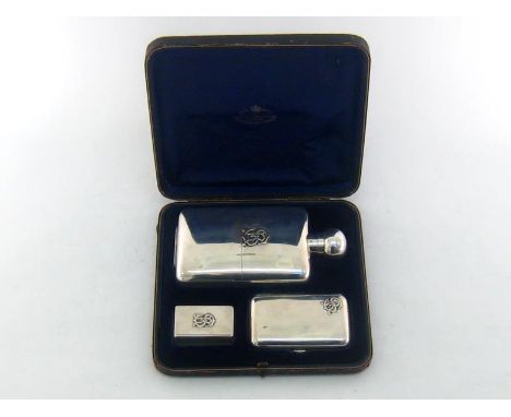 Irish Regimental interest:- a Victorian officer's silver spirits flask, cigarette case and vesta box, the flask and cigarette