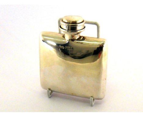 An unusual Edwardian silver spirits flask, the detachable screw-on cap forming a collapsible beaker, by Smith & Bartlam, Birm