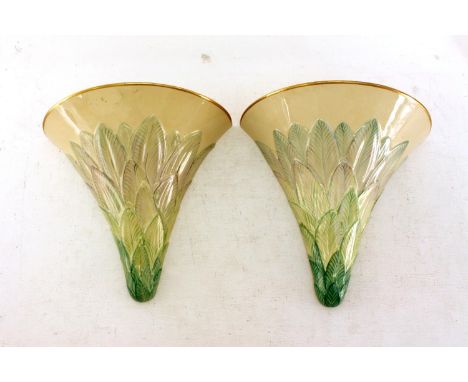 A pair of ceramic 1930s wall pockets with pale green leafage on the cream ground, ship mark of Gray’s Pottery. One very sligh