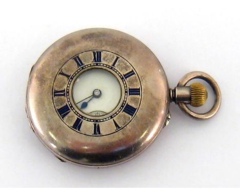 An Edwardian silver half hunter pocket watch, the four piece case hallmarked Chester 1902, the white enamel dial with black p