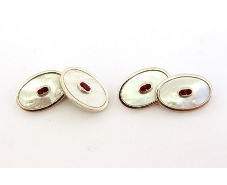 A pair of mother of pearl and synthetic ruby cufflinks, the oval links 20mm long, mounted in white metal stamped '925', 11.6g