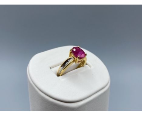 18ct Gold &amp; 1.5ct Oval Ruby Ring with Diamond Accents in very good condition Size N 1/2 weighing 5.2 grams