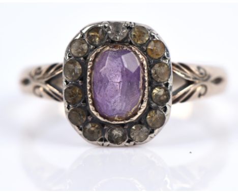 AMENDED DESCRIPTION & IMAGE A collection of items including an antique amethyst and paste set ring, mounted in 9 ct, ring siz