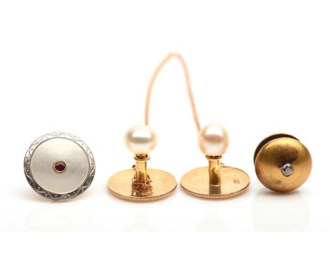 Dress studs, including a pair set with pearls in 18 ct, a single stud set with mother of pearl and ruby in 9 ct, and a single