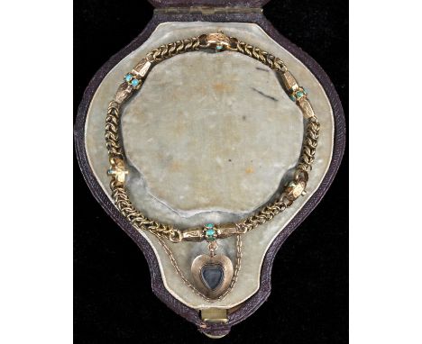 Antique fancy link bracelet, with alternating links, some set with turquoise, with a turquoise set heart charm with glazed pa