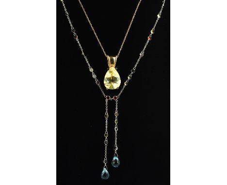 A selection of gem set jewellery including a pear cut coated topaz pendant on a fine chain with a pair of matching earrings, 