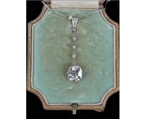 Edwardian diamond pendant, with an old cut diamond 3.72 carats suspended from a rose cut diamond set bale with four old cut d