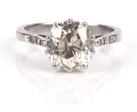 Single stone diamond ring, old cut diamond weighing an estimated 3.06 carats, with three single cut diamonds to each shoulder