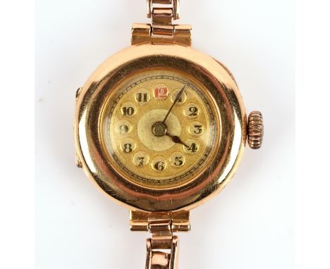 A 1920's Ladies gold wristwatch, the unsigned dial with Arabic numeral hour markers set within a chapter ring, fitted with an
