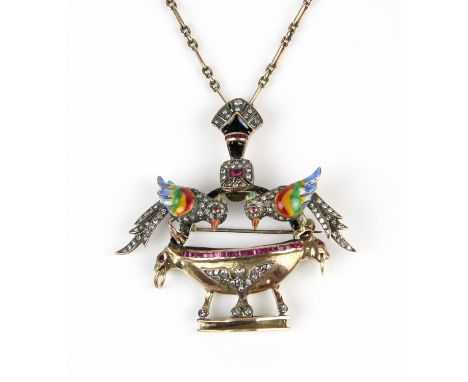 An antique bird necklace, 9 ct pendant depicting two birds, with bodies set with single cut diamonds, ruby eyes and multicolo